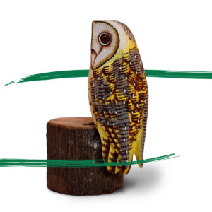 Side shot of a Wooden Barn Owl on a log ornament from Shiny Happy Eco