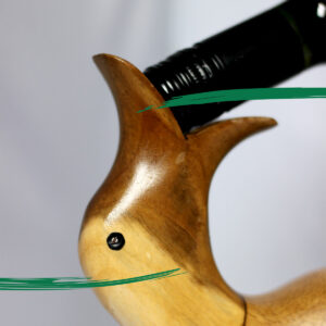 Close up of duck shaped wine holder made out of bamboo from Shiny Happy Eco.
