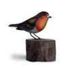 Hand painted wooden Robin ornament sat on log from Shiny Happy Eco