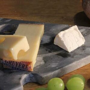 Cheese Board crafted from grey stone. Fair Trade. Cheese slice design.
