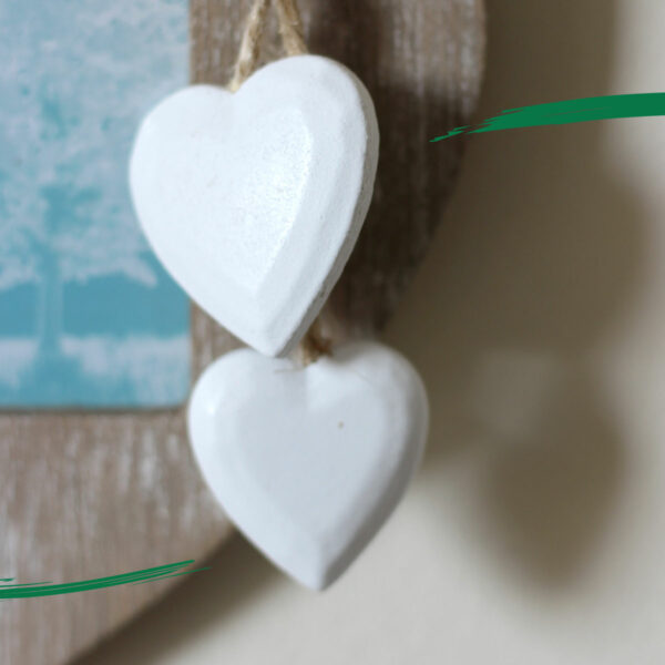 Close up of Heart Shaped Wooden Photoframes - Shiny Happy Eco