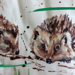 Detail of Hedgehog illustrated fabric doorstop from Shiny Happy Eco