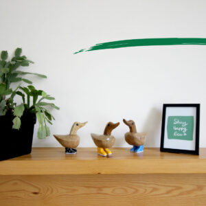 Bamboo ducklings with painted boots - Various colours from Shiny Happy Eco standing on shelf