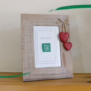 Close up of red hearts on photo frame from Shiny Happy Eco