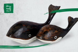 two wooden hand carved whales - part of the new range of eco friendly gifts at Shiny Happy Eco