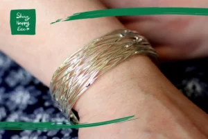 Handmade adjustable Steel bracelet on model available from Shiny Happy Eco