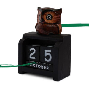 angled view of a Dark brown owl on black block calendar available from Shiny Happy Eco