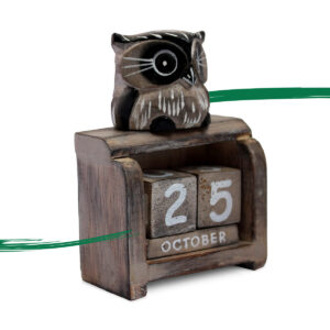 Light brown owl sat on top of a perpetual calendar ornament available from Shiny Happy Eco