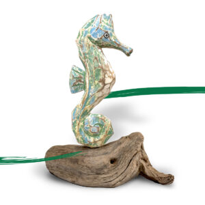 Painted wooden abstract seahorse in shades of green and blue