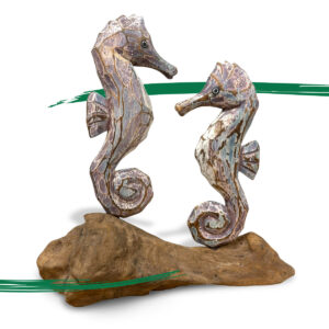 Pair of wooden seahorses on driftwood ornament