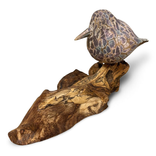 Abstract single bird brown colourings on driftwood with available from Shiny Happy Eco.