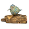 Abstract single bird green and blue shades on driftwood with available from Shiny Happy Eco.