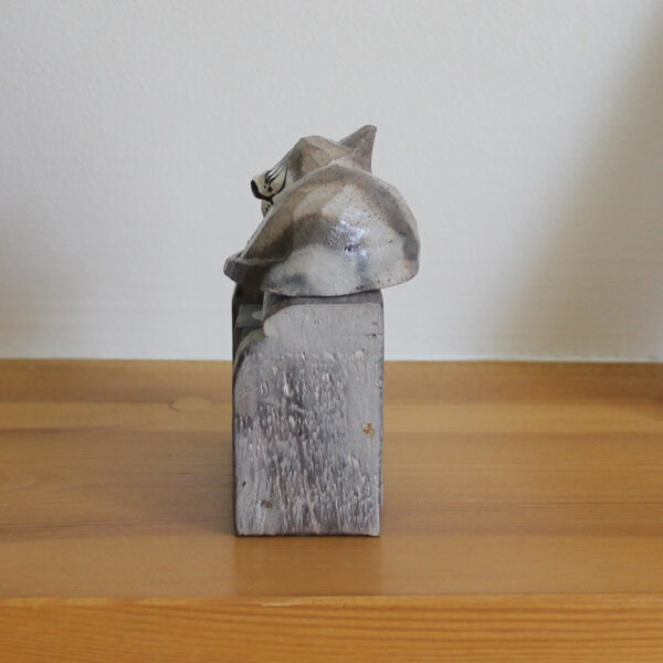 Side view of Sleeping Cat calendar ornament in light brown colourings available from Shiny Happy Eco.