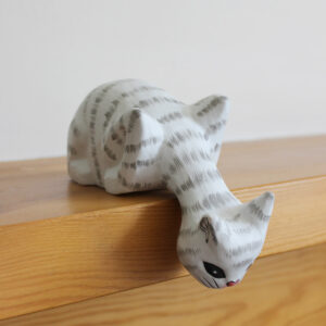 Cat ornament looking off shelf - Hand painted white and grey cat ornaments available to buy from Shiny Happy Eco.