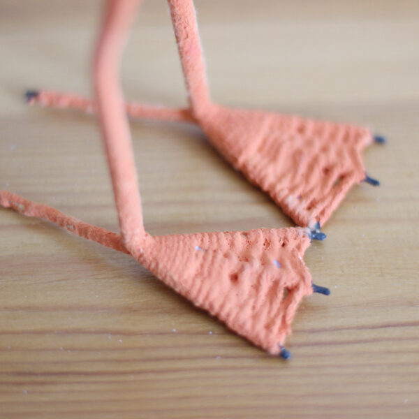 Close up of the feet of a Wooden Painted Seagull ornament - hand made and hand painted. Available from Shiny Happy Eco.