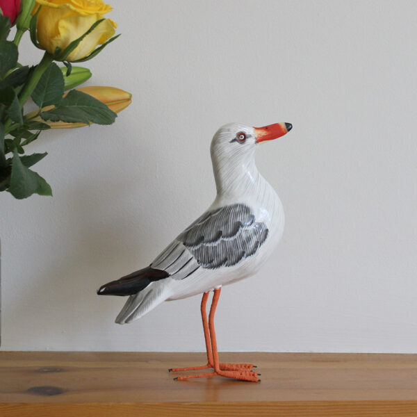 Wooden Painted Seagull ornament on mantlepiece - hand made and hand painted. Available from Shiny Happy Eco.
