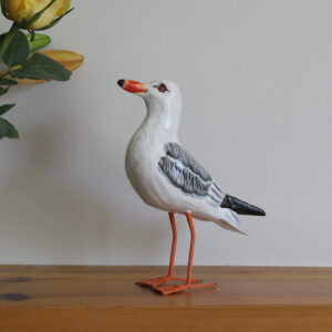 Side view of a Wooden Painted Seagull ornament - hand made and hand painted. Available from Shiny Happy Eco.
