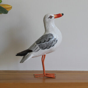 Side view of a Wooden Painted Seagull - hand made and hand painted. Available from Shiny Happy Eco.