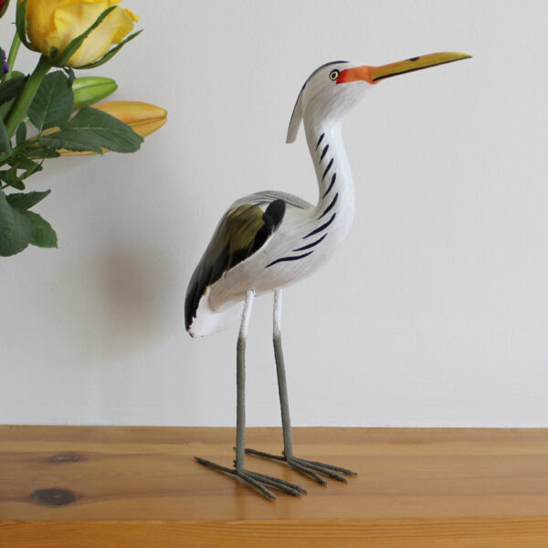 Wooden Heron ornament handmade and hand painted on mantlepiece available from Shiny Happy Eco.