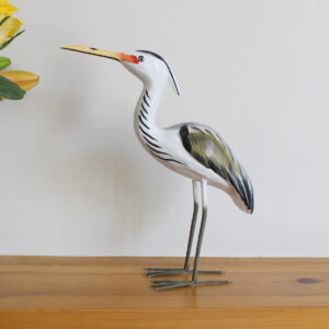 Side view of Wooden Heron ornament handmade and hand painted available from Shiny Happy Eco.