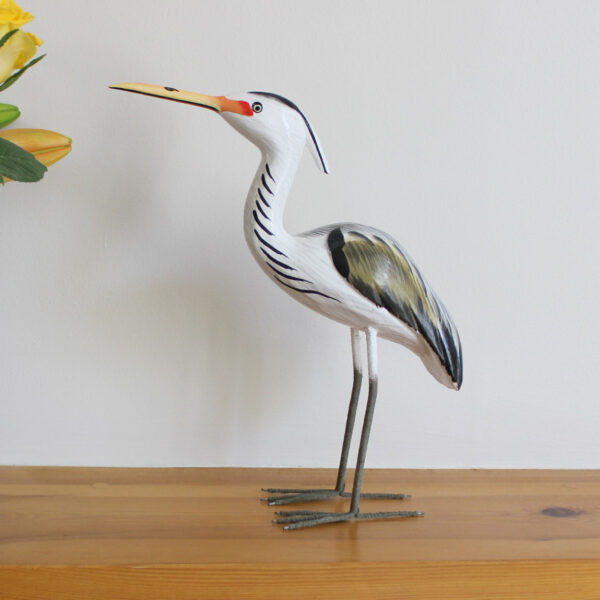 Side view of Wooden Heron ornament handmade and hand painted available from Shiny Happy Eco.