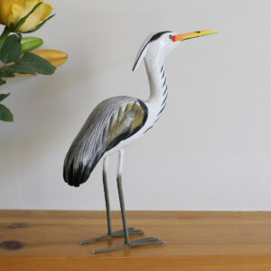 Wooden Heron ornament on shelf handmade and hand painted available from Shiny Happy Eco.