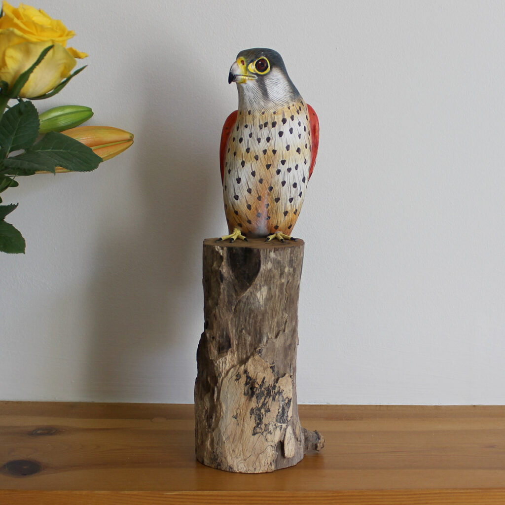 Wooden Kestrel Ornament on mantelpiece available from Shiny Happy Eco