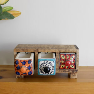 Wooden mini chest of 3 colourful ceramic drawers with two drawers open from Shiny Happy Eco
