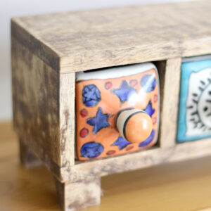 Close up of handprinted drawer in Wooden mini chest of 3 colourful ceramic drawers from Shiny Happy Eco
