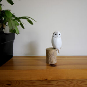 Wooden Snowy Owl ornament hand carved and painted on mantlepiece from Shiny Happy Eco