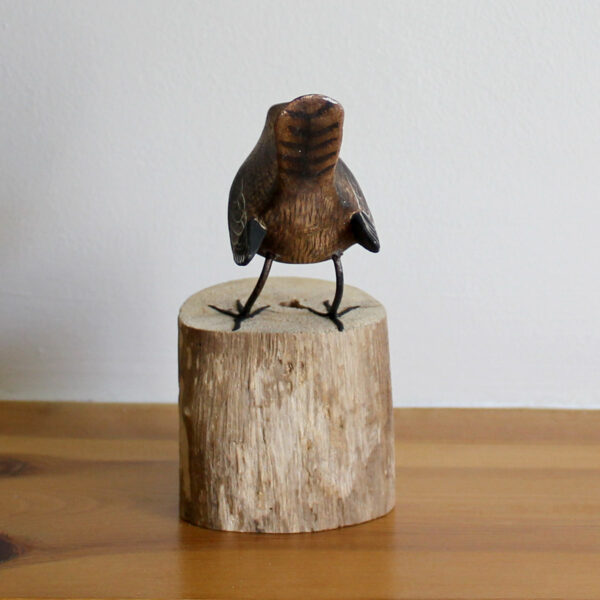 Rear view of Hand carved and painted Wooden Wren Ornament on driftwood available from Shiny Happy Eco.