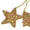 Golden handmade star decoration for a Christmas decoration.